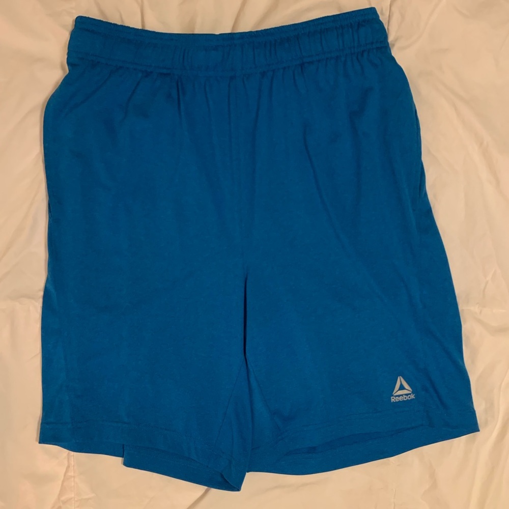 Blue Reebok athletic shorts